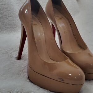 Christian Louboutin Tan and Red Heels Classic.